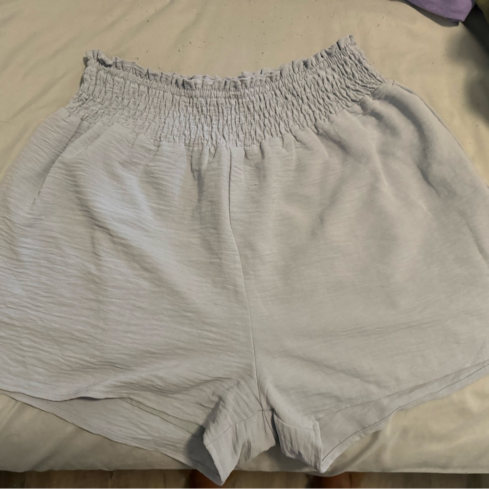 Size large paper bag shorts. Worn a few times.